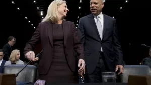 Former Homeland Security Secretary Jeh Johnson, right, and Homeland Security Secretary Kirstjen Nielsen, and former arrive for a Senate Intelligence Committee hearing in Washington on Wednesday, March 21, 2018. (AP Photo/Andrew Harnik)