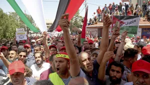 Jordanian protesters shout slogans during a demonstration outside the in front of the Labour Union office, in Amman, Jordan, Wednesday, June 6, 2018. (AP Photo/Raad al-Adayleh)