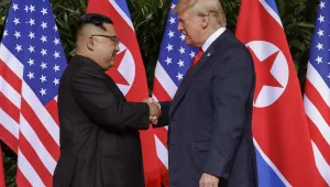 U.S. President Donald Trump shakes hands with North Korea leader Kim Jong Un at the Capella resort on Sentosa Island Tuesday, June 12, 2018 in Singapore. (AP Photo/Evan Vucci)