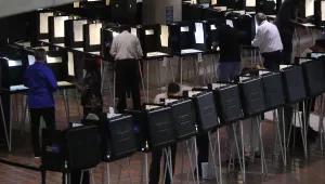 People vote on the first day of early voting in Miami-Dade County, Monday, Oct. 22, 2018.