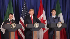 President Donald Trump, center, Canada's Prime Minister Justin Trudeau, right, and then-Mexican President Enrique Pena Nieto hold a joint news conference before signing a new United States-Mexico-Canada Agreement in Buenos Aires, Argentina on Nov. 30, 2018 (AP Photo/Martin Mejia).