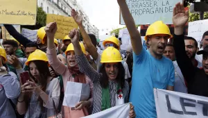 Students carry banners and chant slogans during a demonstration in Algiers, Algeria, Tuesday, April 16, 2019. 