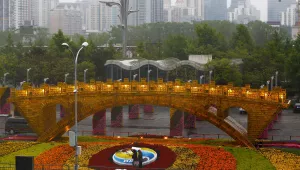 Workers dismantle the Belt and Road Forum logo next to the “Golden Bridge of Silk Road” structure outside the media center as leaders are attending the round table summit of the Belt and Road Forum chaired by Chinese President Xi Jinping in Beijing, Saturday, April 27, 2019