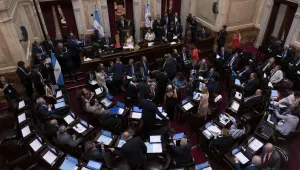 Senators participate in a session in Buenos Aires, Wednesday, Feb. 5, 2020. Senators will debate a government proposed bill on Wednesday to renegotiate the restructuring of the nation's $100 billion debt, which officials say is not payable amid a deep recession. 