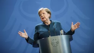 German Chancellor Angela Merkel speaks at a press conference about coronavirus, in Berlin, Sunday, March 22, 2020.