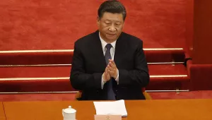Chinese President Xi Jinping applauds during the opening session of the Chinese People's Political Consultative Conference (CPPCC) at the Great Hall of the People in Beijing, Thursday, May 21, 2020. 