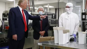 Photo of President Donald Trump (without a mask) touring Puritan Medical Products medical swab manufacturing facility, Friday, June 5, 2020, in Guilford, Maine. 