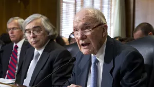 Former National Security Adviser under Presidents Gerald Ford and George H. W. Bush, Brent Scowcroft, right, delivers his opening remarks on Capitol Hill in Washington, Tuesday, April 9, 2013.