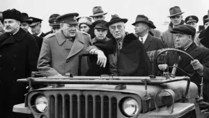 In this photo provided by the Department of Defense, President Franklin D. Roosevelt sits in a jeep at Yalta with British Prime Minister Winston Churchill and V.M. Molotov, Feb. 1945.