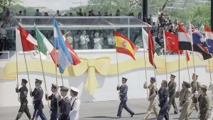 Soldiers marching with national flags in parade