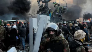 File - In this file photo taken on Wednesday, Feb. 19, 2014, The "Heavenly Hundred" is what Ukrainians in Kiev call those who died during months of anti-government protests in 2013-14. The grisliest day was a year ago Friday _ on Feb. 20, 2014 _ when sniper fire tore through crowds on the capital's main square, killing more than 50 people. A year later, so much has changed. Russia has annexed Ukraine’s Crimean Peninsula, Ukraine has a new president and government, and the country is embroiled in a war in th