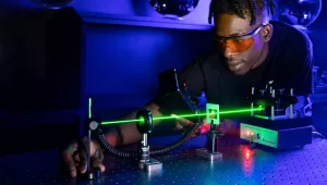 ATE student learning to measure output power from a laser