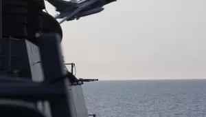 A Russian Sukhoi Su-24 attack aircraft makes a low altitude pass by the USS Donald Cook in the Baltic Sea, April 12, 2016