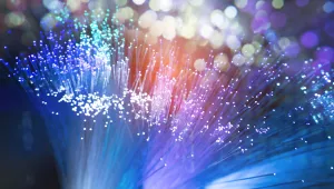 A close-up of fiber optic cables with many colors