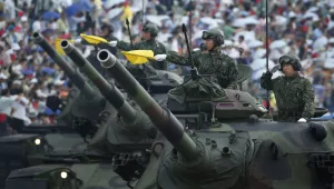 Taiwan's military displays tanks in a parade in Hsinchu, northern Taiwan, Saturday, July 4, 2015.