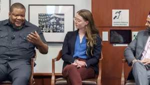 Nnaemeka Ikegwuonu, Morgan Richmond, and Romi Bhatia speak on a panel