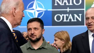 NATO Secretary General Jens Stoltenberg, United States President Joe Biden, Ukraine's President Volodymyr Zelenskyy and NATO Deputy Secretary General Mircea Geoana stand during a meeting of the NATO-Ukraine Council during a NATO summit in Vilnius, Lithuania, Wednesday, July 12, 2023. 