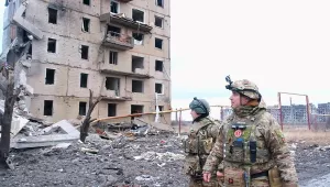 Ukrainian troops examine the destruction caused by Russian shelling in Toretsk, Donetsk Oblast.