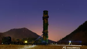 Image of China’s People’s Liberation Army Rocket Force drill with a ballistic missile launcher 