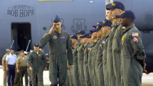 Air Force Senior Airman Curtis Towne salutes as he returns home from Hainan on April 12, 2001. He was a crewmember on the U.S. Navy EP-3 aircraft that was involved in an accident with a Chinese F-8 aircraft on April 1, 2001.