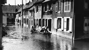 French soldiers paddling from house to house in an inundated western front village searching for food in France on June 7, 1940. The French voluntarily flooded the village in an attempt to hold up the blitzkrieging German army. 