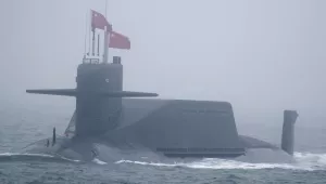 A type 094A Jin-class nuclear submarine Long March 10 of the Chinese People's Liberation Army (PLA) Navy participates in a naval parade to commemorate the 70th anniversary of the founding of China's PLA Navy in the sea near Qingdao in eastern China's Shandong province, April 23, 2019.