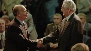 Bosnia President Alija Izetbegovic, left, shakes hands with Croatia President Franjo Tudjman in Dayton, Ohio, Wednesday, Nov. 1, 1995.