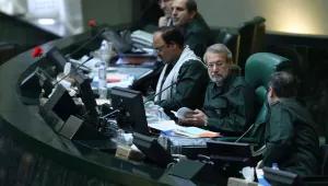 Iranian parliamentarians dressing in IRGC uniforms to demonstrate solidarity  following the Trump administration's terrorist designation of the organization.