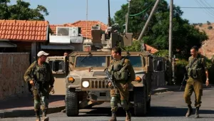  A picture taken on August 26, 2019, shows Israeli soldiers patrolling near the northern Israeli town of Avivim, close to the border with Lebanon.