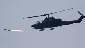 A U.S. made AH-1W attack helicopter launches a Hellfire missile Thursday, July 20, 2006, in Ilan, Taiwan. 