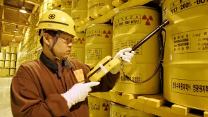 A worker checks the radioactivity of drums containing nuclear waste at Yonggwang Nuclear Power Site in Yonggwang, South Korea.