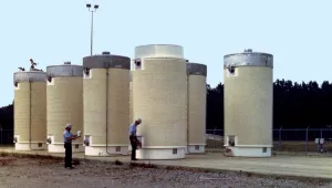 Vertical dry cask storage of spent nuclear fuel is depicted here.