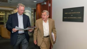 Chairman of Alphabet, Inc. (Google) Eric Schmidt checks out the Belfer Center newsletter with Center Director Graham Allison on the way to a presentation during at a Center Director’s Lunch in May.