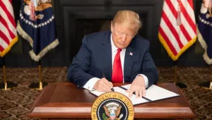 President Trump signs an Executive Order in Bedminster, New Jersey, entitled “Reimposing Certain Sanctions with Respect to Iran.”