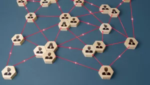 A blue abstract background with hexagon shapes being connected via a red line.