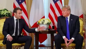 U.S. President Donald Trump talks with France’s President Emmanuel Macron during their meeting at Winfield House in London on December 3, 2019.