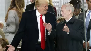 President Donald Trump, left, talks to Defense Secretary James Mattis 