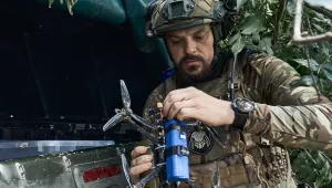 A Ukrainian soldier prepares a drone on the frontline in the Zaporizhzhia region, Ukraine.