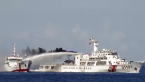 Chinese Coast Guard and Vietnamese Coast Guard ships at sea