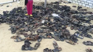 Discarded shoes of victims remain outside Al-Rawda Mosque in Bir al-Abd northern Sinai, Egypt. a day after attackers killed hundreds of worshippers, on Saturday, Nov. 25, 2017. 