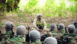Al-Shabab's spokesman, Ali Mohamud Rage, speaks to Kenyan foreign fighters at one of the Islamist insurgent group's military training camps in Somalia in 2017. 