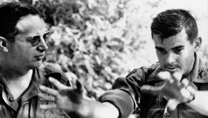 Bernard D. Fall, left, talks with Major Robert Schweitzer