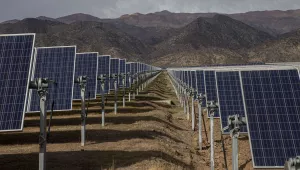 Solar panels stand in the Quilapilún solar energy plant