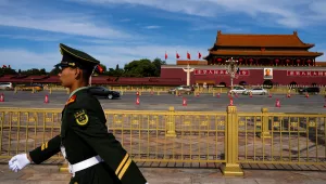 A Chinese soldier stands guard next to Tiananmen Square