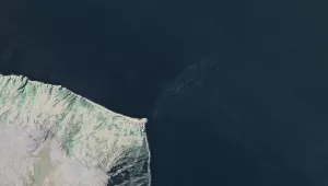 A satellite view of Little Diomede Island, Alaska, in the middle of the Bering Strait. 