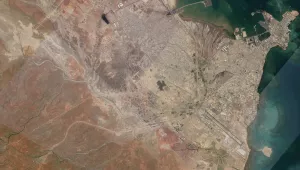 A satellite view of Djibouti, showing the U.S. Navy’s Camp Lemonnier (bottom) and the People’s Liberation Army Support Base (top).