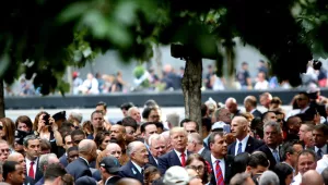 Former New York City Mayor Rudy Giuliani, Donald Trump, and New Jersey Governor Chris Christie talk in the World Trade Center 9/11 Memorial in Manhattan, NY, on September 11, 2016.