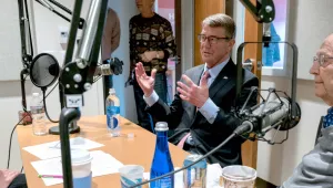 Lisa Perry, left, interviews Secretary Ash Carter, center, and her grandfather, Secretary William Perry, right, for the podcast "At the Brink."