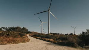 Wind turbines next to a dirt road in Portugal