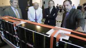 U.S. Energy Secretary Steven Chu, second from right, listens as Jason Forcier, right, Vice President and General Manager of A123 Systems, shows off a battery 